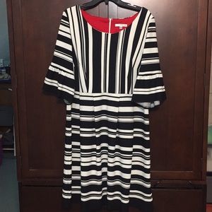 Knee length striped dress.